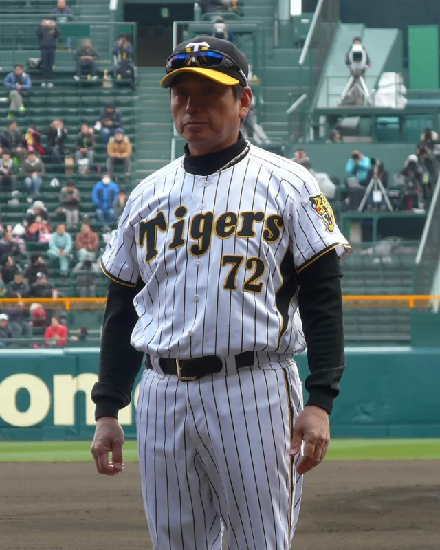 真弓明信