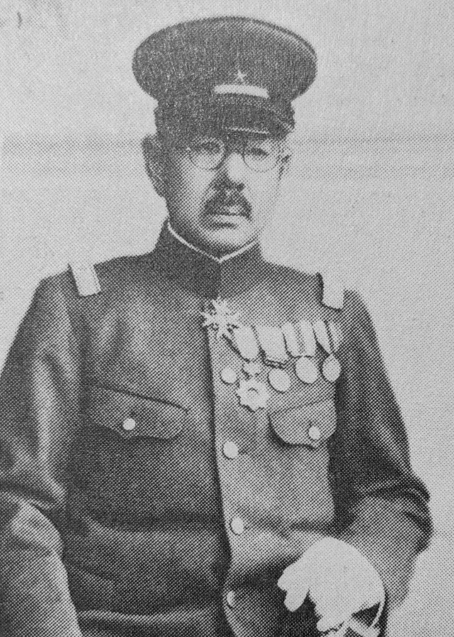 谷儀一