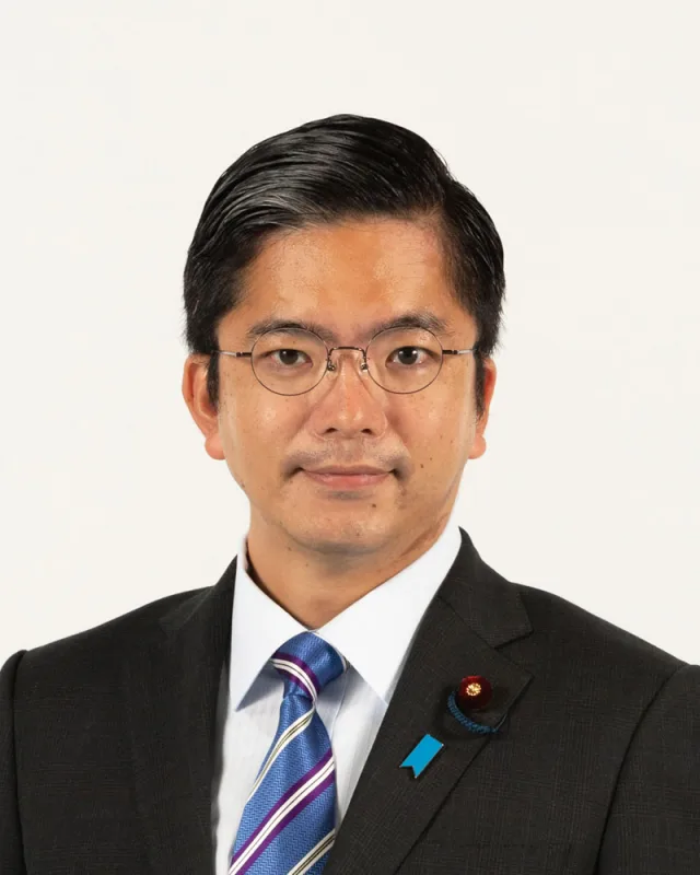 金子容三