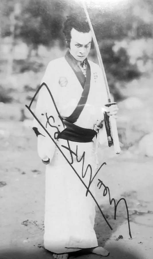 團徳麿